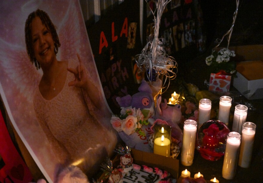 Candles, photos, stuffed animals and a birthday cake were brought to celebrate the life of La'Nyiah 'Lala' Clark Saturday night, Feb. 28, 2026 during a vigil in Wilkes-Barre.