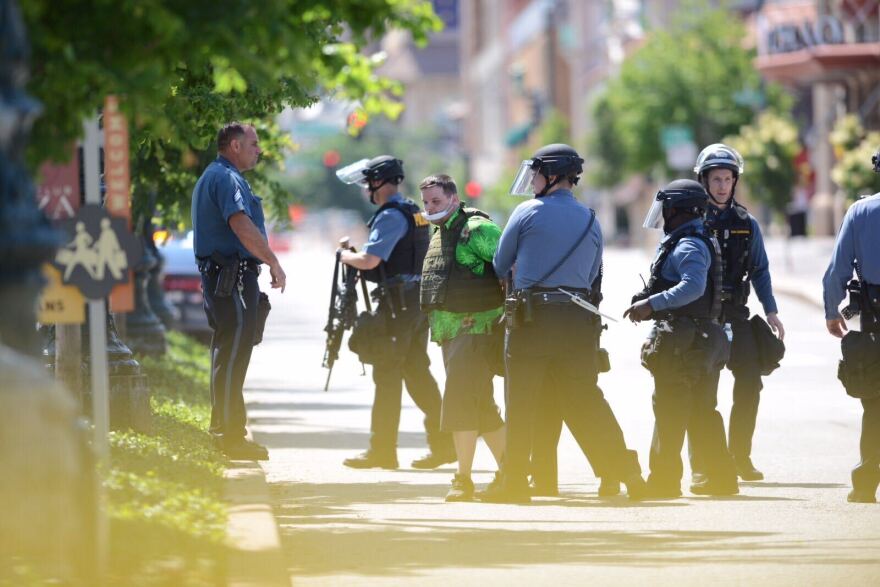 Two armed men were arrested on the Plaza shortly before 3:30 p.m. on Sunday.