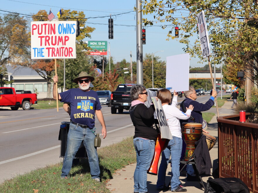 Protesters stood outside the Fayette County GOP headquarters as Republicans rallied inside on Saturday, October 24, 2026.