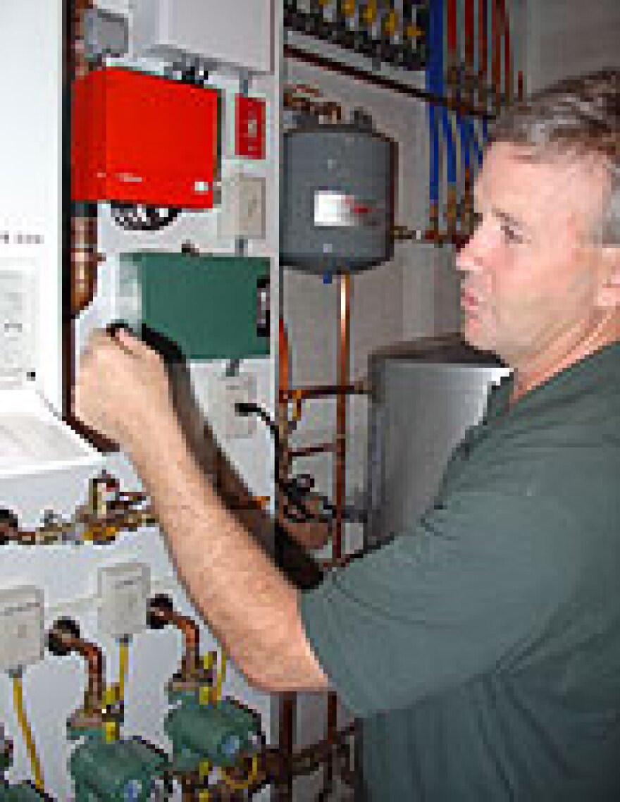 Stack inside the Skaneateles Lake home. The house is made with natural floors and surfaces, with air filters placed throughout. The heating system is zoned, and the furnace and water heater are sealed to prevent emission contamination.