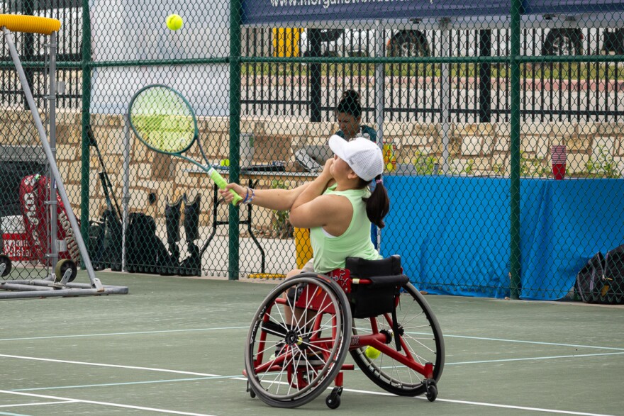 Lily Terall plays a match of tennis at Morgan's Sports Complex for the STRAPS.