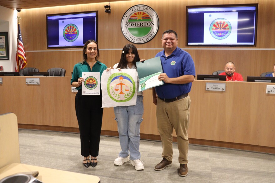 Showing off the Somerton Municipal Court's new seal: (from left to right) Somerton Municipal Judge Edna Lugo, Naylea Lopez Fimbres and Somerton Mayor Gerardo Anaya.