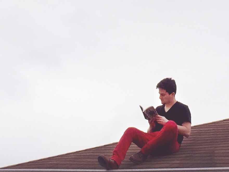 Don't try this at home: Critic Juan Vidal experiments with reading on the roof.