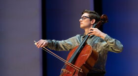 Joshua Kovac playing his cello