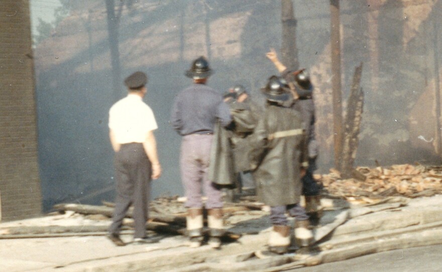 people and burned building