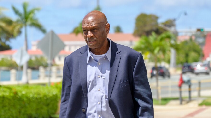 Pictured: VIPA Executive Director Carlton Dowe walks outside the Ron De Lugo Federal Building United States Courthouse today after being indicted on bank fraud.