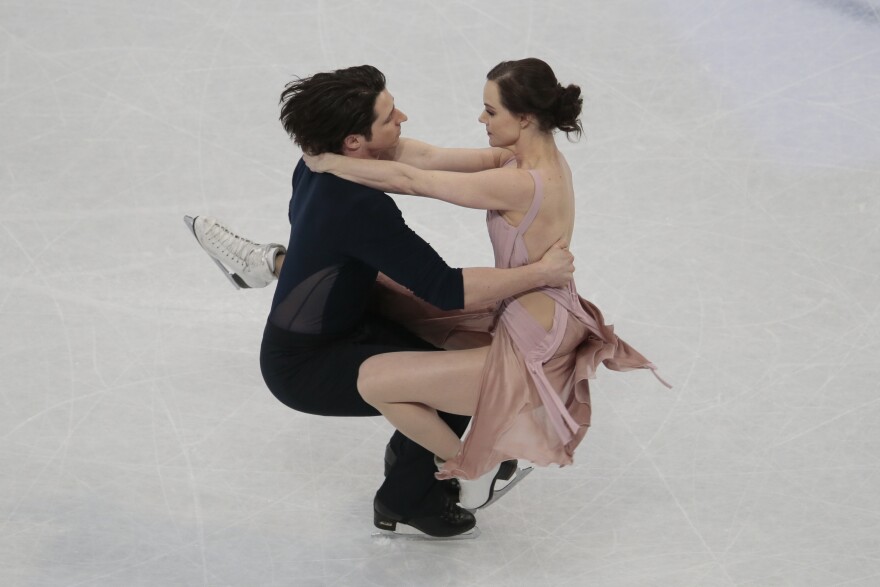 The pair skate their free dance to win the gold at the world figure skating championships in Helsinki, Finland, in April 2017.