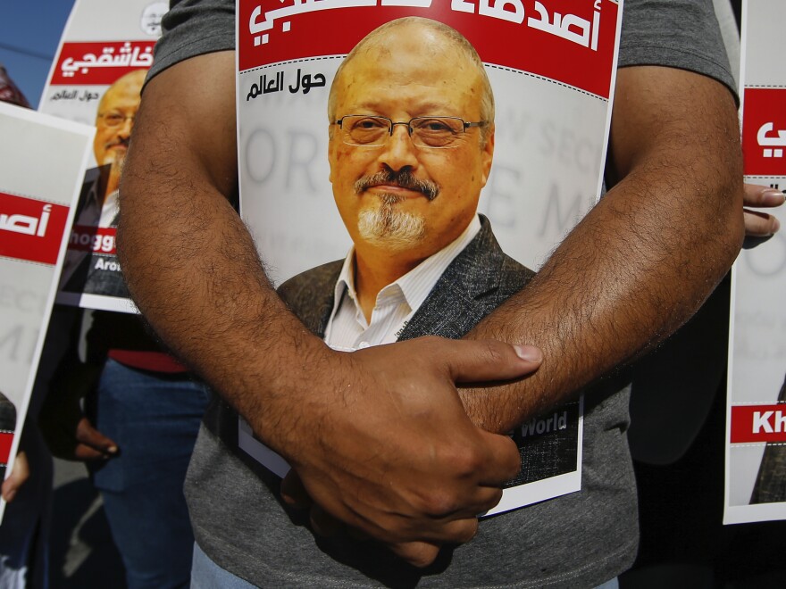 People hold posters of slain Saudi journalist Jamal Khashoggi, near Saudi Arabia's consulate in Istanbul, on Oct. 2, 2020. A federal judge dismissed a U.S. lawsuit against Saudi Crown Prince Mohammed bin Salman in the Saudi killing of U.S.-based journalist Jamal Khashoggi on Tuesday, Dec. 6, 2022, bowing to the Biden administration's insistence that the prince was legally immune in the case.