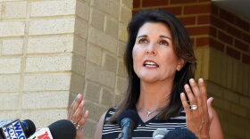 FILE - Former South Carolina Gov. Nikki Haley speaks with reporters after a campus tour of South Carolina State University on April 12, 2021, in Orangeburg, S.C. (AP Photo/Meg Kinnard)