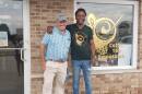 Jeff Foster and Jack Crest standing outside of Common Grounds Coffee Tea & Smoothies