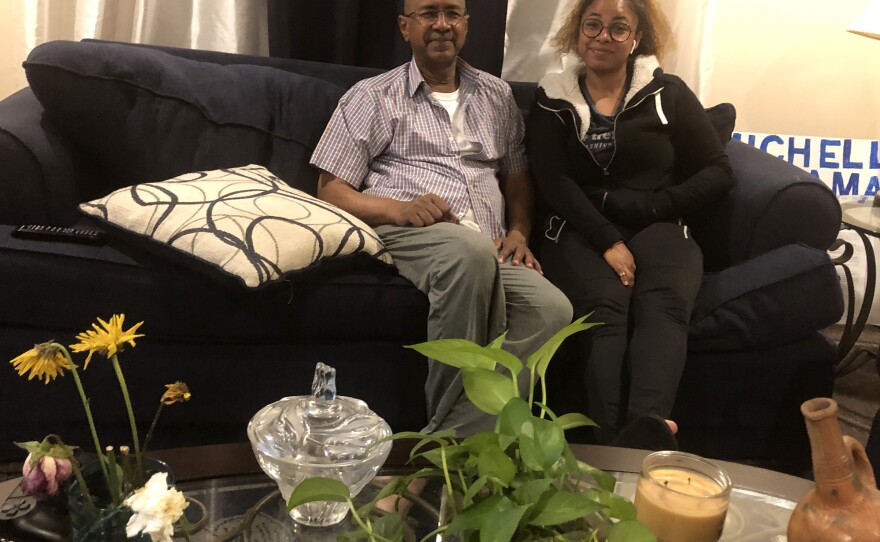 Ithar Gabriel and her father, Hamror Gabriel, in their apartment living room in West Springfield, Massachusetts.