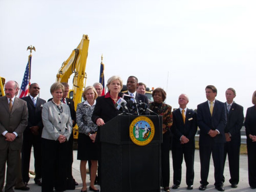 At I-485 mile marker 21, Governor Bev Perdue is flanked by elected officials from the Charlotte region