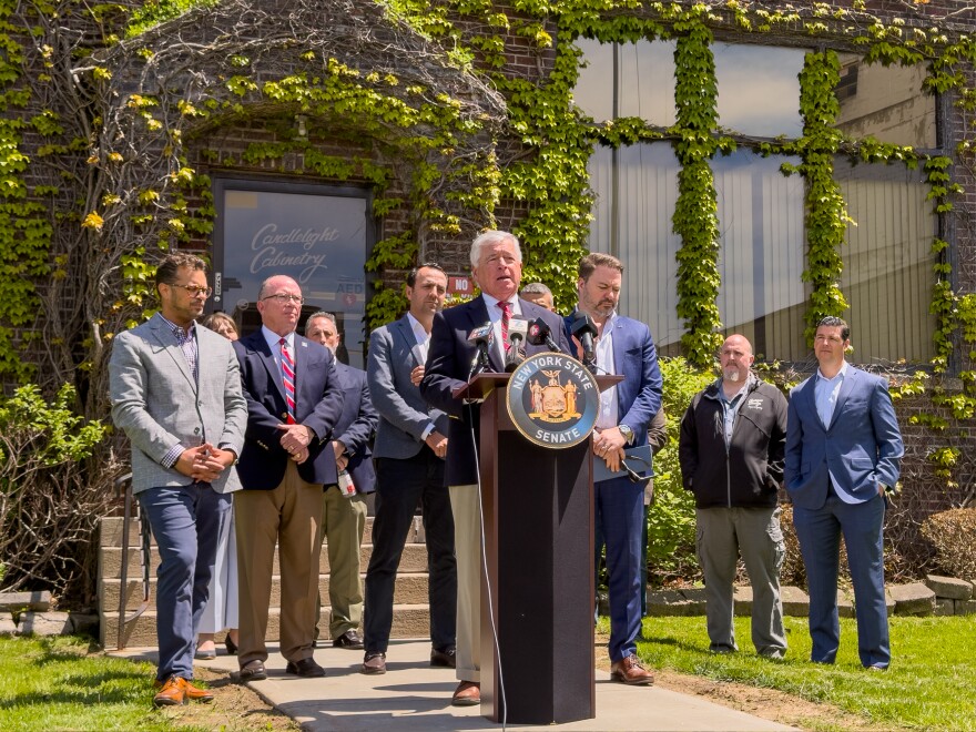 Candlelight Curated CEO Peter Demakos speaks in front of the business in Lockport on May 15, 2026.