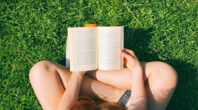 Reading in the park. (Getty Images)