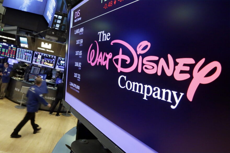 In this Monday, Aug. 7, 2017, photo, The Walt Disney Co. logo appears on a screen above the floor of the New York Stock Exchange. (Richard Drew/AP)