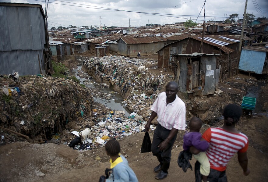 In Kibera, Kenya's biggest slum, plastic bags are found everywhere — on roofs, on walls and clogging drainage. The Kenyan government says an almost total ban on plastic bags will benefit the environment.