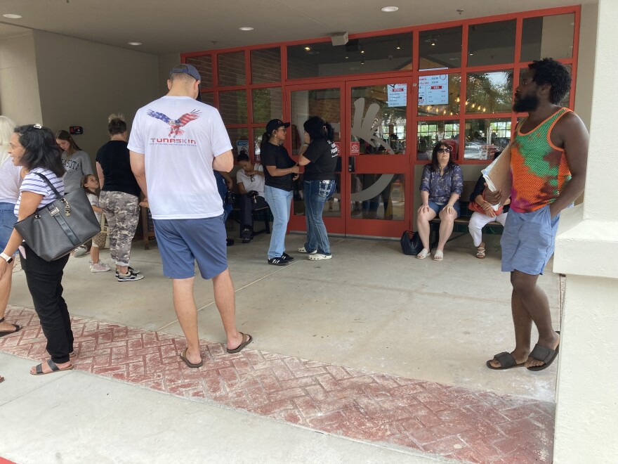 People wait to get into the newly re-opened Sweet Tomatoes restaurant in South Fort Myers. The place had been closed the past six years.