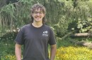 Jason Ogg, founder of Mansfield Permaculture, surveys the landscape in an overgrown area of Mansfield's Liberty Park.