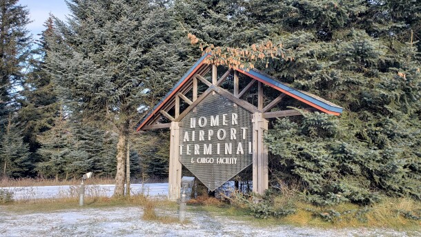 The sign for the Homer Airport Terminal on Tuesday, Nov. 21. Kenai Aviation will end regular flights to Homer at the end of this year.