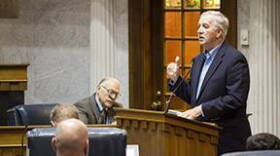 County Commissioner Bruce Buchanan, R-Benton County, testified before the Energy, Utility & Telecommunications legislative study committee on the value of wind energy and potential conflicts of interest for public officials.