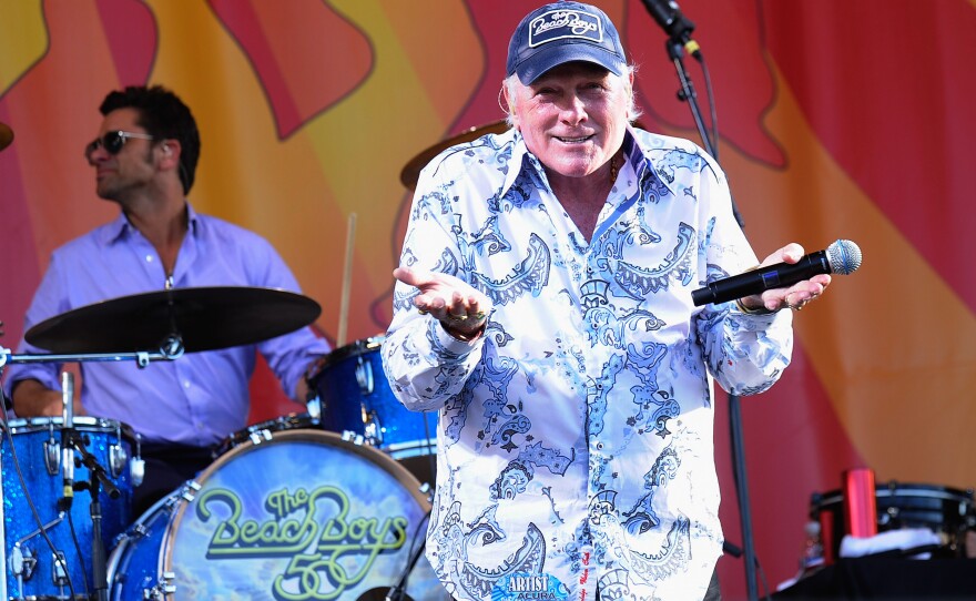 NEW ORLEANS, LA - APRIL 27: Actor John Stamos joins Mike Love of The Beach Boys on stage and performs during the 2012 New Orleans Jazz & Heritage Festival Presented by Shell at the Fair Grounds Race Course on April 27, 2012 in New Orleans, Louisiana. (Photo by Rick Diamond/Getty Images)