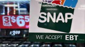 FILE - A SNAP EBT information sign is displayed at a gas station in Riverwoods, Ill., Nov. 1, 2025. (AP Photo/Nam Y. Huh, File)