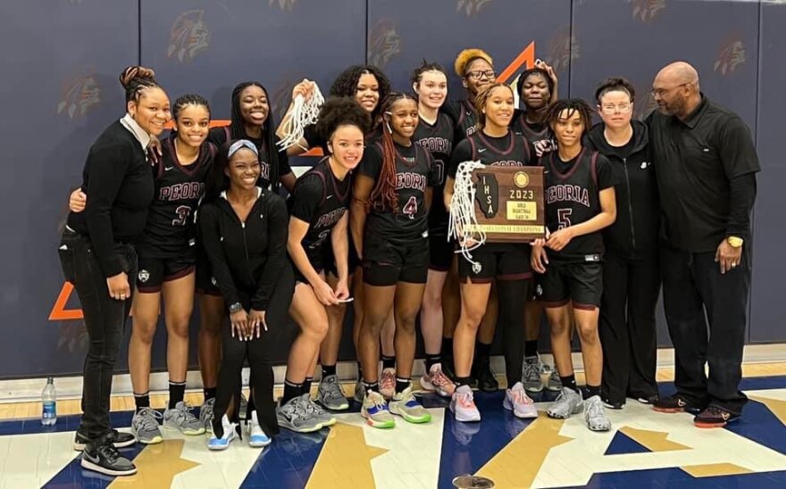 The Peoria High School girls basketball team celebrates its IHSA Class 3A Pontiac Supersectional victory over Marian Catholic on Monday night. The third-ranked Lions advanced to play No. 1 Nazareth Academy in Friday's 10 a.m. semifinal at CEFCU Arena in Normal.