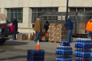 Volunteers work to distribute items during a Ruby's Pantry event at the Bemidji Sanford Center on March 19, 2026.