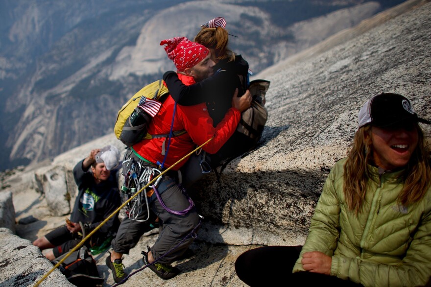 Skelton hugs his wife, Tucker Hirsch, as they reach the summit of Half Dome in Yosemite National Park in 2013.