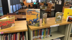 On the book shelves at the Arnett Blvd. Branch library