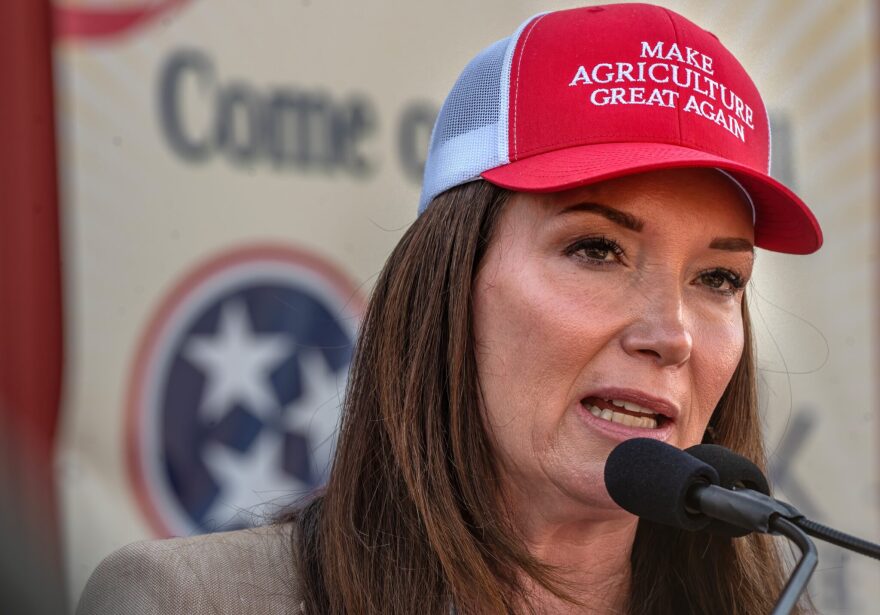 U.S. Agriculture Secretary Brooke Rollins speaks while wearing a red hat.