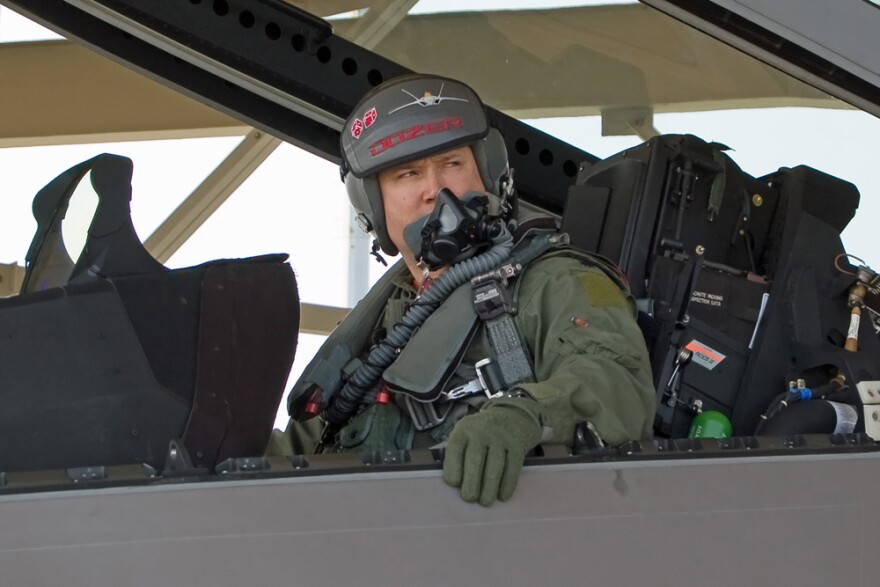 Lt. Col. Mike Shower prepares for an F-22 Raptor training sortie. (U.S. Air Force photo/Scott Wolfe)