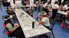 Students use VR headsets at Tech Week Grand Rapids' Tech Showcase.