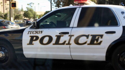 black and white Tucson police car