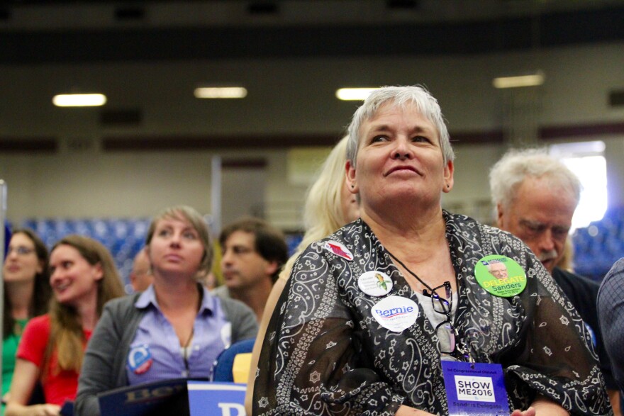 A supporter of Vermont Sen. Bernie Sanders is seated for the Missouri Democratic Party convention in Sedalia.