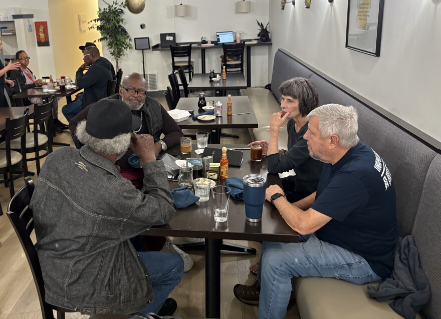Left to right: Willie, Dwight Ivory, Karin and Bud Steffen met at Orenda Cafe through the Senior Dine Out program and have become friends.