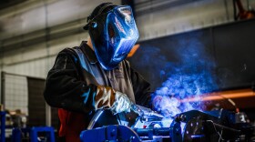 A worker at Brandt Industries, which recently opened a manufacturing site in McLean County.
