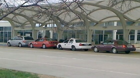 Taxis await passengers at the Tulsa International Airport