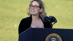 Sen. Kyrsten Sinema, D-Ariz., speaks before President Joe Biden signs the $1.2 trillion bipartisan infrastructure bill into law during a ceremony on the South Lawn of the White House in Washington, Nov. 15, 2021. Sinema received a $1 million surge of campaign cash over the past year from private equity professionals, hedge funds and venture capitalists whose interests she has staunchly defended in Congress. That's according to an Associated Press review of campaign finance disclosures.