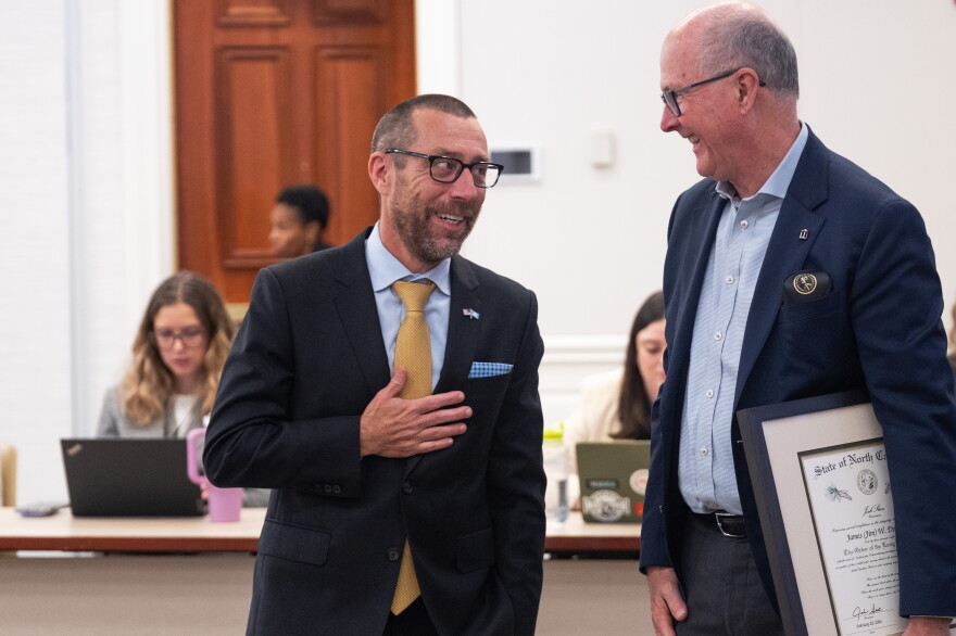 UNC Board of Trustees full board meeting held at The Rizzo Center. March 26, 2026. In this photo, current UNC Provost, Magnus Egerstedt (left), speaks with outgoing interim UNC Provost Jim Dean (right).