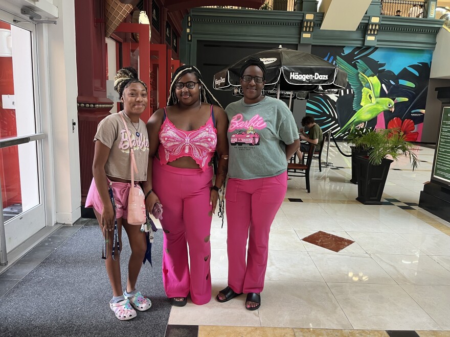 Deneen Nabinett and her daughters dressed up for <em>Barbie</em> on Friday, after seeing <em>Oppenheimer </em>the previous night.