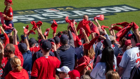 fans at a Cleveland Guardians game cheer