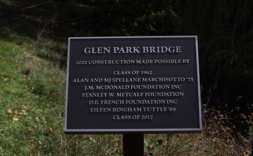The Glen Park Bridge at Wells College in the village of Aurora, New York, is a historic pedestrian bridge that was rebuilt and reopened on May 4, 2023, after years of fundraising by the classes of 2017 and 1962. Wells College has received court approval to sell and transfer artwork, artifacts, rare books and other personal property as it continues to wind down operations after its June 2024 closure. The future of the campus remains unresolved after a proposed $12.5 million sale fell through earlier this year.