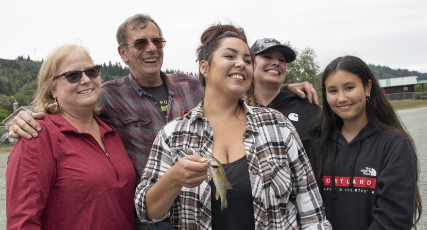 The Gulseths celebrate one of two prize-winning fish caught at the derby. (From L to R:) Tina and Doug Gulseth, niece Rosie Gulseth, daughter Misty Lee and granddaughter Payton Lee. Payton was the big winner of the day, reeling in a $200 fish.