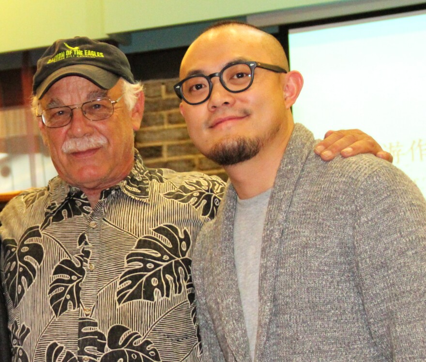 Tom Wilmer (left) with Mo Mao at symposium in Chengdu, China