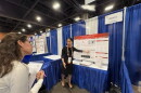 Lily Ma explains her research to judges at this year's Regeneron International Science and Engineering Fair in Phoenix, Arizona.