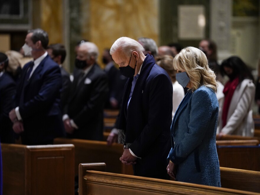 President-elect Joe Biden and his wife, Jill Biden, attend Mass at the Cathedral of St. Matthew the Apostle ahead of his inauguration as the nation's 46th president on Wednesday.