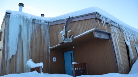 Sleetmute’s roof has been leaking for so long that the wall has started to buckle under the weight of snow and ice.