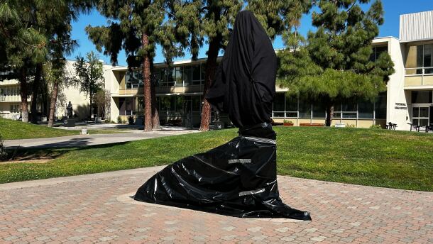 A statue of Cesar Chavez on Fresno State University’s campus is covered with black plastic and duct tape on Wednesday, March 18, 2026.