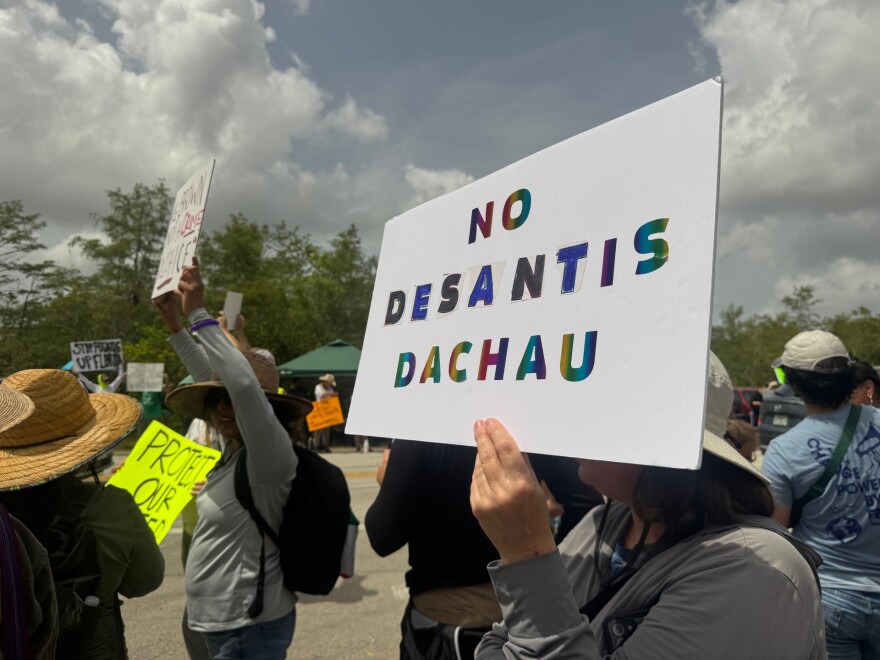 Activities at the site of the so-called "Alligator Alcatraz" immigration detention camp being created at an abandoned jetport in the Big Cypress National preserve in eastern Collier County included truck activity into and out of the site amid a protest of the camp by hundreds including Native Americans, conservation groups and others.